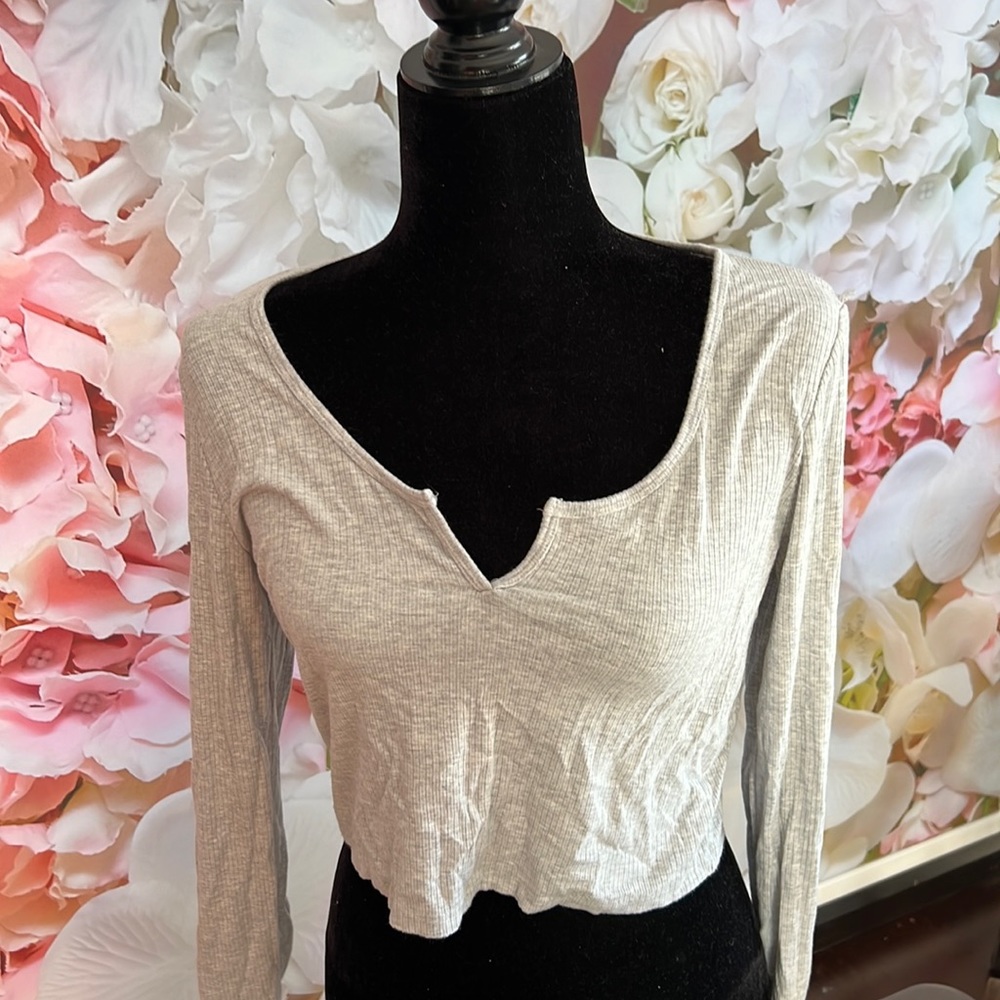 grey garage long sleeve tank. worn a couple times. front notch. FINAL SALE.